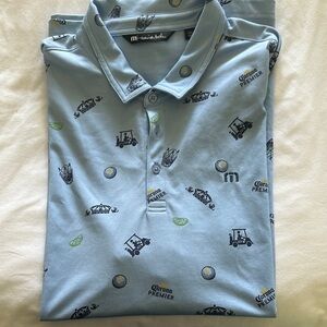 Travis Mathew Blue Polo Shirt with Subtle Pattern